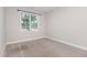 Cozy bedroom with natural light, neutral walls, and comfortable carpeting at 503 Gateway Townes Blvd, Wake Forest, NC 27587