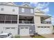 Townhome featuring attached garages, covered porches, and a combination of neutral siding at 503 Gateway Townes Blvd, Wake Forest, NC 27587