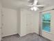 Bright bedroom with a ceiling fan, a carpet floor and a window with natural light at 5105 Carolwood Ln, Durham, NC 27713