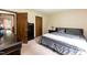 Relaxing bedroom features a comfortable bed, closet, and neutral decor at 523 Edwards Rd, Henderson, NC 27537