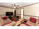 Bright living room featuring hardwood floors and neutral walls perfect for relaxing and entertaining at 523 Edwards Rd, Henderson, NC 27537