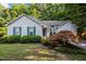 Charming home featuring tidy landscaping, blue shutters, and a well-maintained yard at 5405 Swordsman Ct, Knightdale, NC 27545