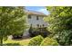 Exterior of home with lush green backyard at 5545 Moneta Ln, Apex, NC 27539