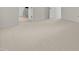 Bedroom featuring neutral carpet, doorway to other rooms and white trim at 5545 Moneta Ln, Apex, NC 27539