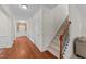 Entryway with wood floors, wainscoting and a staircase at 5545 Moneta Ln, Apex, NC 27539