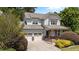 Charming home featuring a covered porch and a two-car garage at 5545 Moneta Ln, Apex, NC 27539