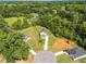 Aerial view of the home and lot outlined in red, showing its location within a cul-de-sac at 567 E Ridge Ave, Liberty, NC 27298