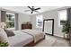 Inviting bedroom with neutral colors, a large mirror, and a comfortable rug at 567 E Ridge Ave, Liberty, NC 27298