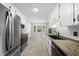 Well-equipped kitchen with stainless steel appliances and ample cabinet space at 6009 Shadow Moss Cir, Raleigh, NC 27603