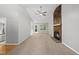 Inviting living room with fireplace and sliding door to deck at 6009 Shadow Moss Cir, Raleigh, NC 27603