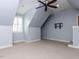 Large bedroom featuring a vaulted ceiling, carpet and tv mount at 612 Peach Orchard Pl, Cary, NC 27519