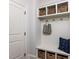 Mudroom with coat rack, storage, and pillow at 612 Peach Orchard Pl, Cary, NC 27519