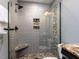 Elegant shower featuring a glass surround and decorative mosaic tiling at 612 Peach Orchard Pl, Cary, NC 27519
