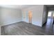The bedroom offers ample space, hardwood floors, and access to the hallway and a closet at 659 Bandon Aly, Cary, NC 27513