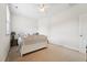 Bright bedroom with carpet, one window and white headboard at 7 Teahouse Ct, Durham, NC 27707