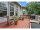 Cozy deck with outdoor seating and a grill, perfect for enjoying the outdoors at 7 Teahouse Ct, Durham, NC 27707