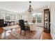 Formal dining room showcasing elegant furnishings and abundant natural light at 7 Teahouse Ct, Durham, NC 27707