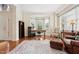 Well-lit office with a bay window, hardwood floors, and traditional furnishings at 7 Teahouse Ct, Durham, NC 27707