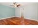 Serene bedroom featuring hardwood floors and a calm color palette at 7604 Copper Creek Ct, Wake Forest, NC 27587