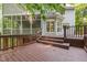 Multi-level wooden back deck with access to screened in porch at 7604 Copper Creek Ct, Wake Forest, NC 27587