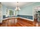 Spacious living room featuring a bay window offering natural light and hardwood floors at 7604 Copper Creek Ct, Wake Forest, NC 27587