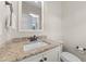 Bathroom featuring granite counters, white cabinets, and vanity at 80 Shallow Falls Ln, Benson, NC 27504