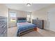 Well-lit bedroom with neutral walls, plush carpet, and dark wood furniture creating a peaceful and inviting space at 80 Shallow Falls Ln, Benson, NC 27504