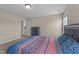 Serene bedroom featuring a cozy bed, neutral paint, plush carpet, and stylish furnishings providing a relaxing retreat at 80 Shallow Falls Ln, Benson, NC 27504
