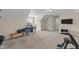 Spacious bonus room offers endless possibilities with ample natural light, carpet, and versatile arrangement for work and play at 80 Shallow Falls Ln, Benson, NC 27504