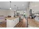 Spacious kitchen with granite countertops, a large island, and modern stainless steel appliances at 80 Shallow Falls Ln, Benson, NC 27504