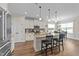 Bright kitchen featuring a large center island, granite countertops and modern stainless steel appliances at 80 Shallow Falls Ln, Benson, NC 27504