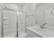 The new bathroom offers a full-sized shower, a toilet, a sink with a mirror, and plenty of counter space at 800 Hillfarm Dr, Wake Forest, NC 27587