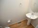 This bathroom features a modern sink, wood floors, and stainless steel hardware at 803 High Ct, Hillsborough, NC 27278