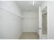 Walk-in closet has ample storage with wire shelving and easy access to bathroom at 803 High Ct, Hillsborough, NC 27278