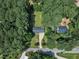 Aerial view of home nestled in a lush, green landscape at 804 Colonial Dr, Raleigh, NC 27603