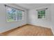 Comfortable bedroom features hardwood floors and ample natural light at 804 Colonial Dr, Raleigh, NC 27603