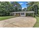 Charming single-story home with brick and white siding, and an inviting carport at 804 Colonial Dr, Raleigh, NC 27603
