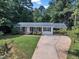 Inviting single-story home with well-kept lawn and convenient attached carport at 804 Colonial Dr, Raleigh, NC 27603