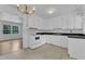 The kitchen features white cabinets and ample counter space at 804 Colonial Dr, Raleigh, NC 27603
