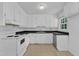 The kitchen features white cabinets and ample counter space at 804 Colonial Dr, Raleigh, NC 27603