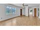 Bright living room featuring hardwood floors and a large window for natural light at 804 Colonial Dr, Raleigh, NC 27603