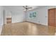 Bright living room featuring hardwood floors and a large window for natural light at 804 Colonial Dr, Raleigh, NC 27603