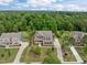 Beautiful home with a landscaped front yard, mature trees, and a long driveway for ultimate curb appeal at 814 Covered Bridge Trl, Chapel Hill, NC 27517