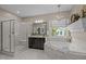 Bathroom featuring a standing glass shower, bath tub, and chandelier at 814 Covered Bridge Trl, Chapel Hill, NC 27517