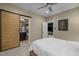 Bedroom with a modern barn door leading to a bathroom and a view into a media room at 814 Covered Bridge Trl, Chapel Hill, NC 27517
