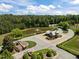 Beautiful community entrance with a tranquil pond, fountain, gazebo, and meticulously maintained landscaping at 814 Covered Bridge Trl, Chapel Hill, NC 27517