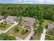 Lovely two-story home with a pool and manicured landscaping, set amidst a lush, green landscape at 814 Covered Bridge Trl, Chapel Hill, NC 27517