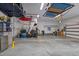 Bright, organized garage with storage racks, bike storage, and ample space for vehicles and projects at 814 Covered Bridge Trl, Chapel Hill, NC 27517