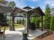Charming gazebo with a built-in grill and ample space for outdoor cooking and entertaining at 814 Covered Bridge Trl, Chapel Hill, NC 27517