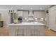 Elegant kitchen featuring a center island, designer backsplash, and a modern range hood at 814 Covered Bridge Trl, Chapel Hill, NC 27517